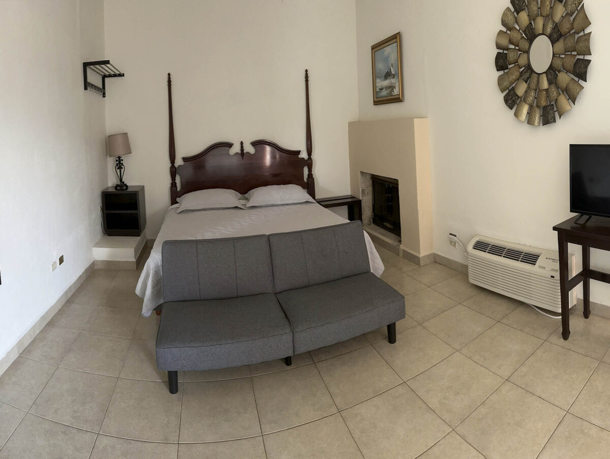 Suite King con cama king y sofá cama
